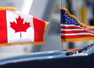 Da li Kanada zaista razmatra rat sa SAD-om? Zastave Kanade i Sjedinjenih Američkih Država jedna pored druge